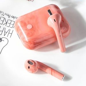 Marble pink wireless earbuds w/ silicone cover